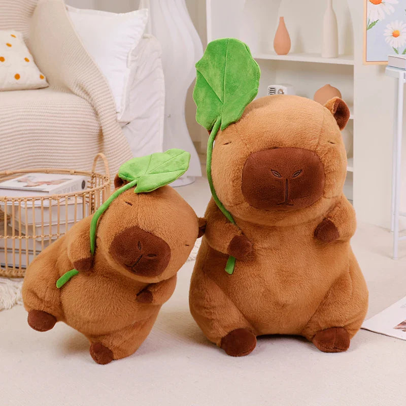 Adorable Kawaii Capybara Plushie Cuddling a Leaf