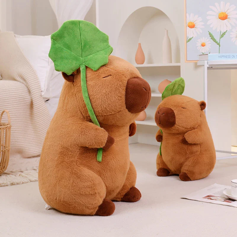 Adorable Kawaii Capybara Plushie Cuddling a Leaf