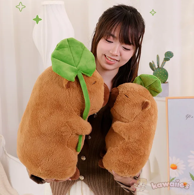 Adorable Kawaii Capybara Plushie Cuddling a Leaf