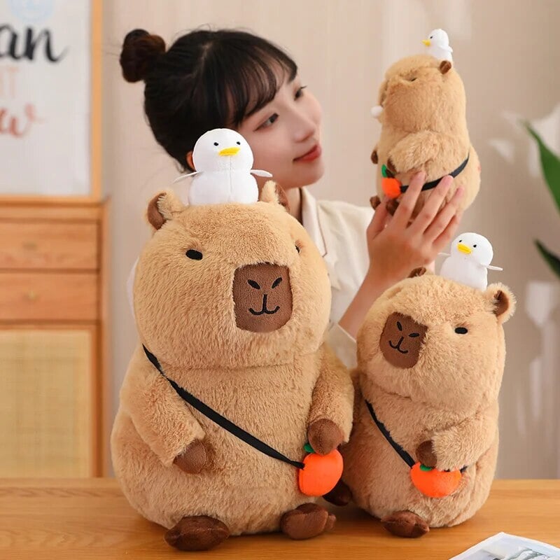 Cozy Capybara Cuddle Buddy with Vibrant Orange Plushie