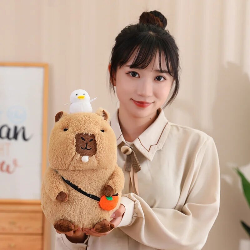 Cozy Capybara Cuddle Buddy with Vibrant Orange Plushie