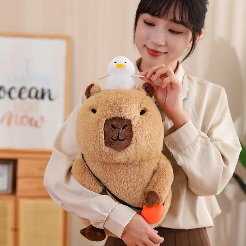 Cozy Capybara Cuddle Buddy with Vibrant Orange Plushie