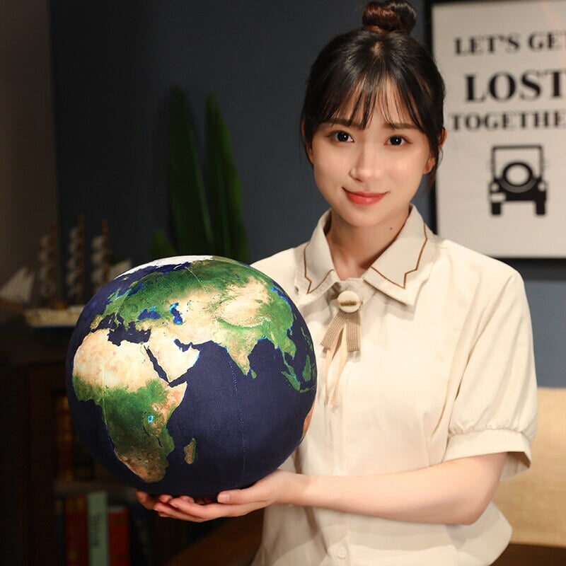 Cuddle Up with a Planet Plushie!