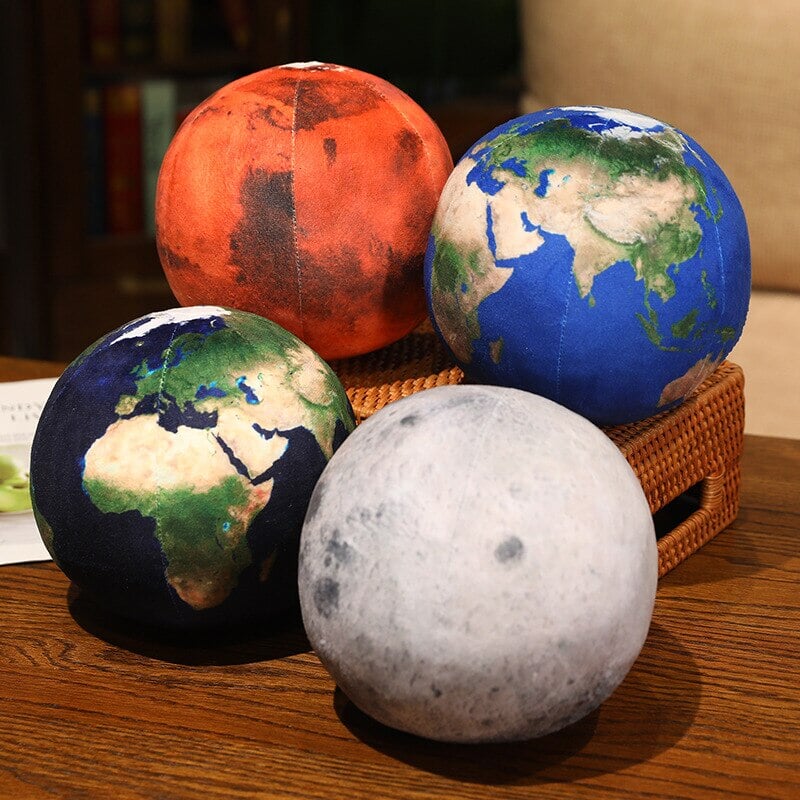Cuddle Up with a Planet Plushie!