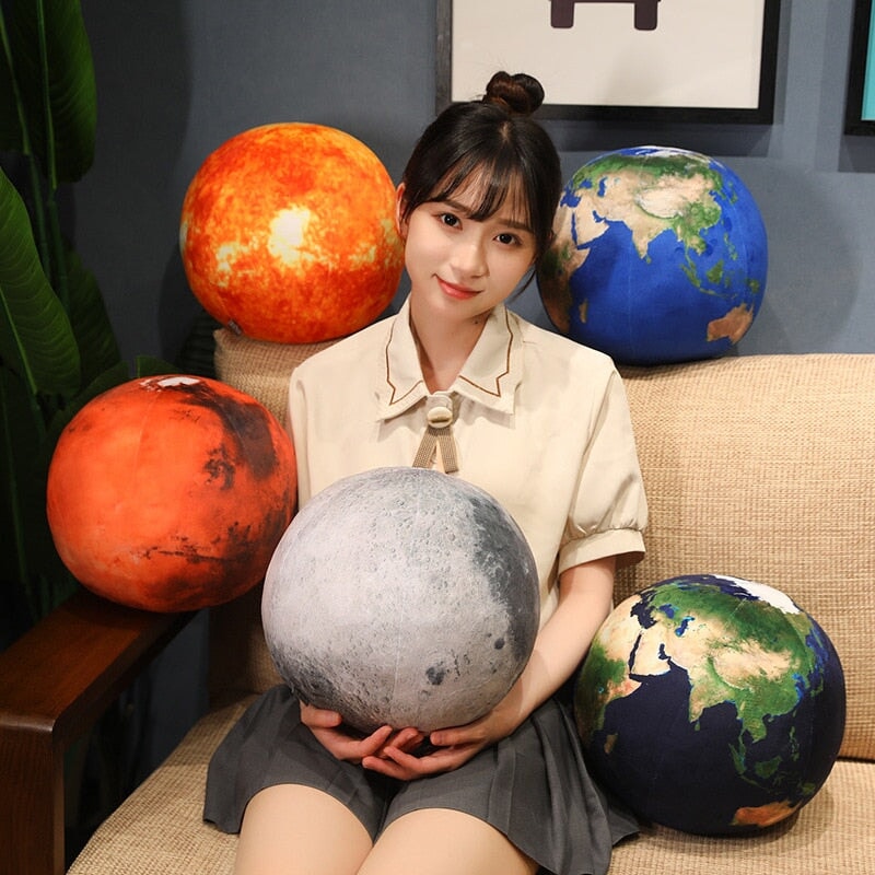 Cuddle Up with a Planet Plushie!