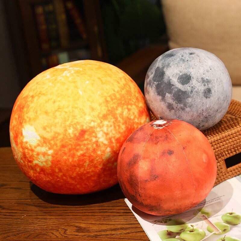 Cuddle Up with a Planet Plushie!