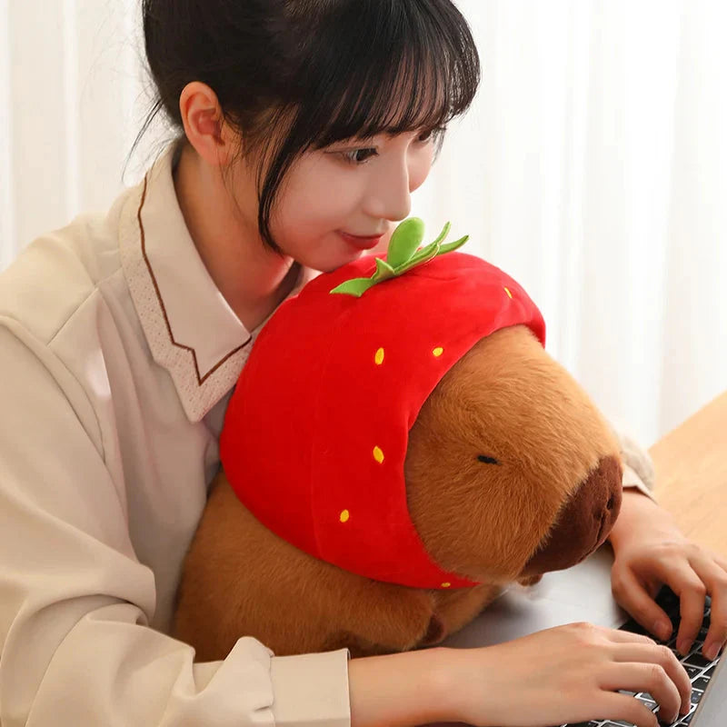 Adorable Capybara Plushie Adorned with a Cute Strawberry Hat