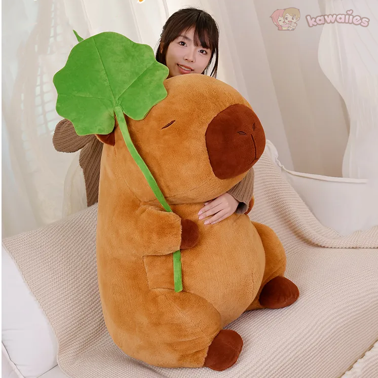 Adorable Kawaii Capybara Plushie Cuddling a Leaf