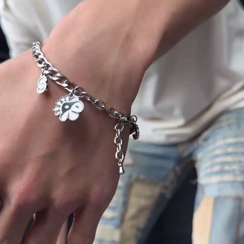 CORTIS pendant bracelet worn